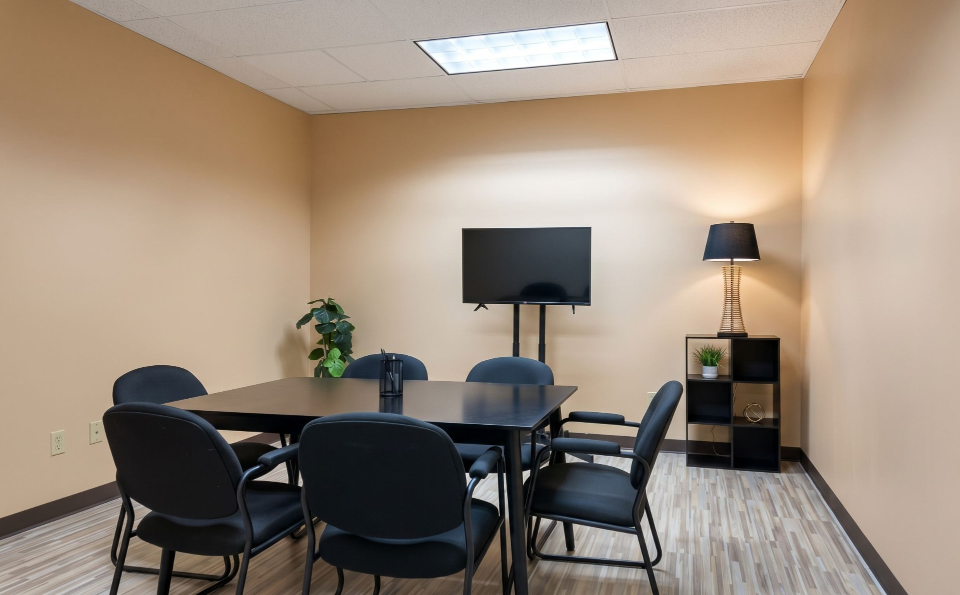 Conference table, chairs and screen in the Suite 350 content studio